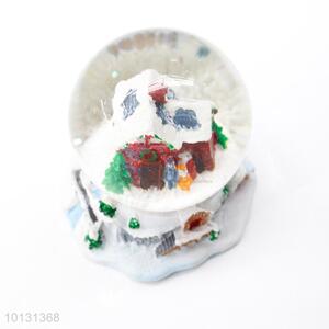 Low price snow-covered house resin crystal ball