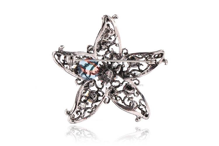 Wholesale new style star shape alloy brooch