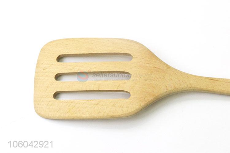 Direct sale natural wooden slotted turner cooking toll