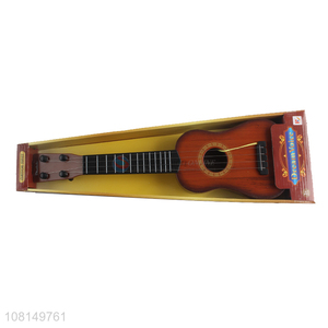 Low price 4 strings children toy ukulele mini guitar wholesale