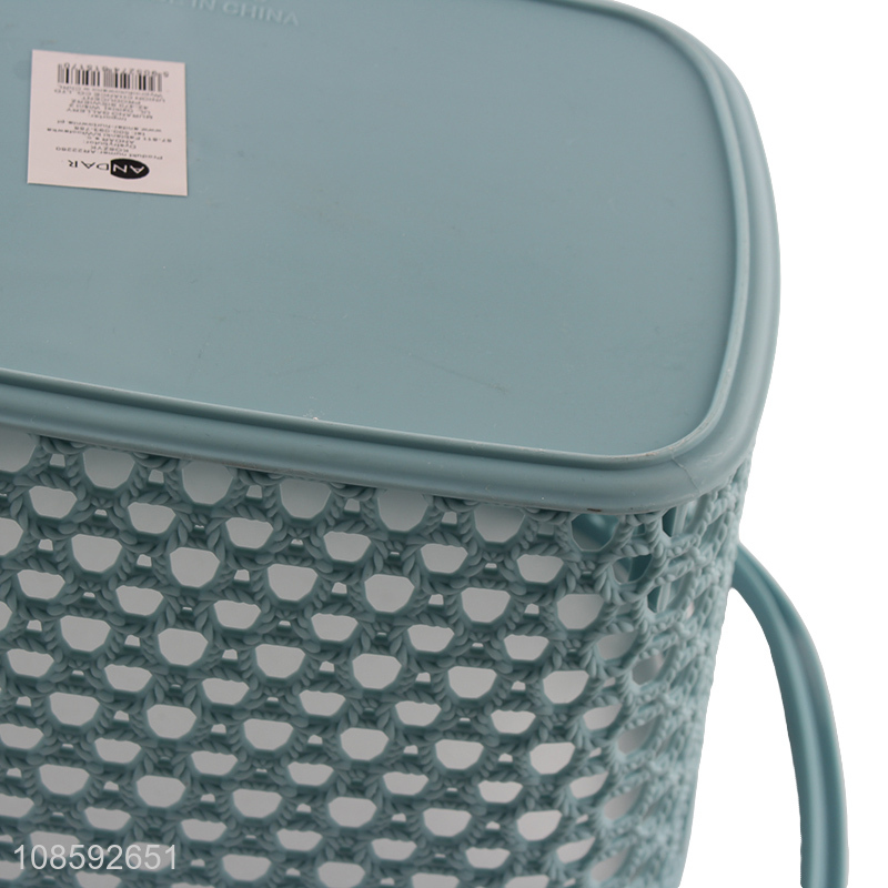 Wholesale hollowed-out plastic storage basket with handles for bathroom