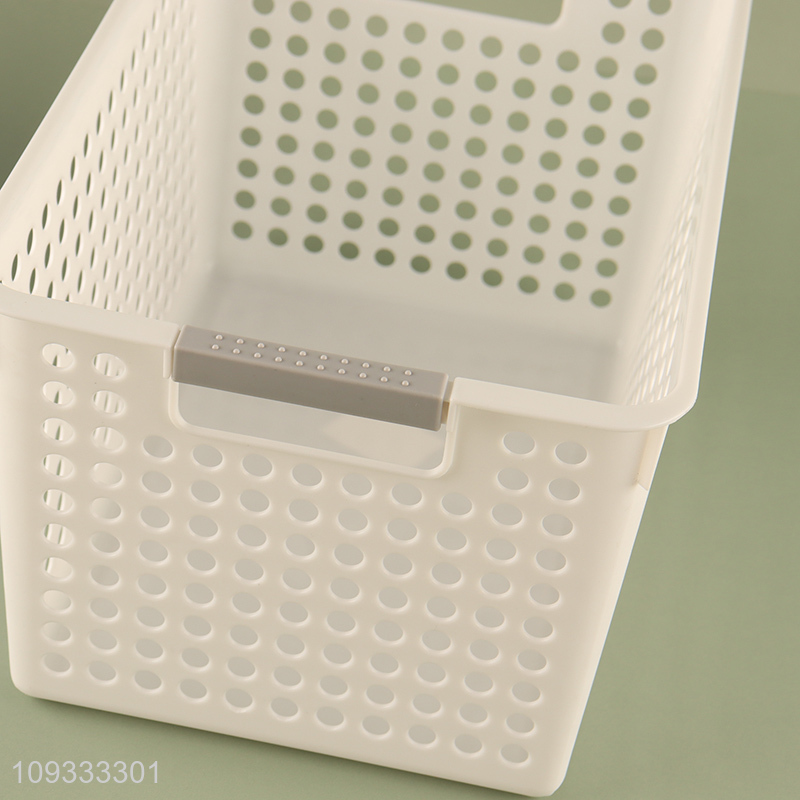 Most popular plastic hollow storage basket with handle